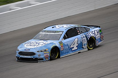 Kevin Harvick takes Kansas pole despite inspection issues