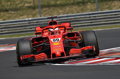 Giovinazzi beats Vettel's lap record to top first test day