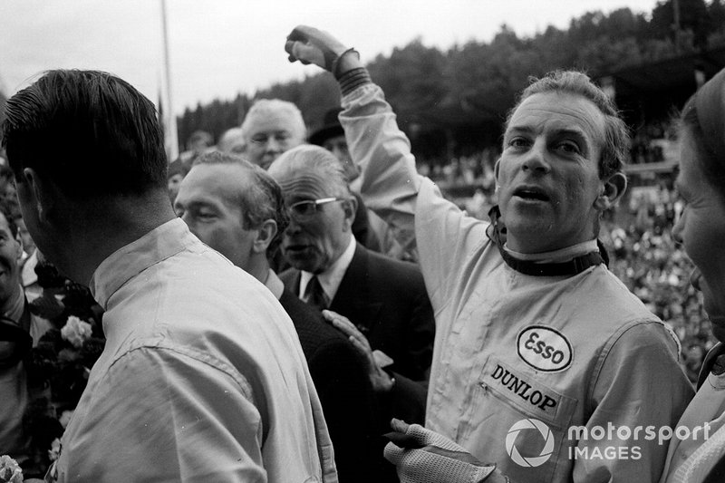 Peter Arundell shares a joke while the podium celebrations take place