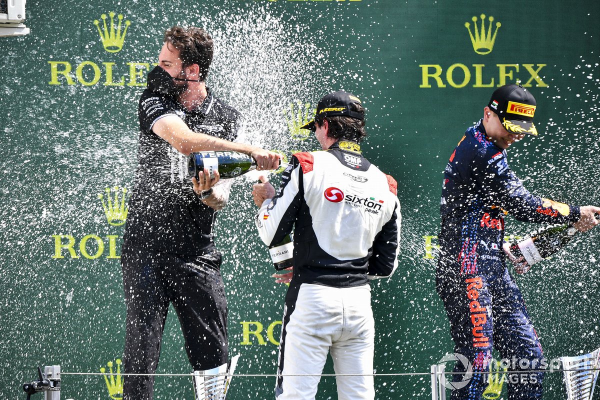 Colombo and Campos Jr celebrate on the podium at the Hungaroring. The win would be taken away, but Colombo won again on merit in the next round at Spa