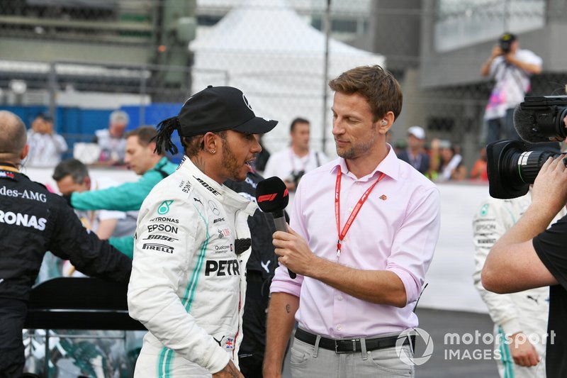 Lewis Hamilton, Mercedes AMG F1, 1st position, is interviewed by Jenson Button, Sky Sports F1, after the race