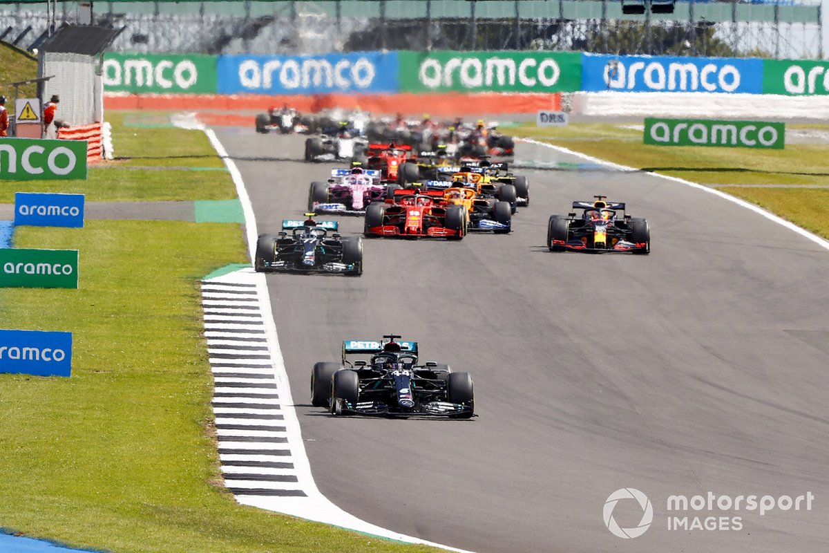 Lewis Hamilton, Mercedes F1 W11 Valtteri Bottas, Mercedes F1 W11 and Max Verstappen, Red Bull Racing RB16 at the start of the race