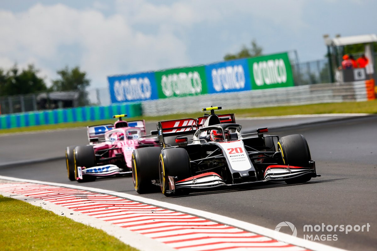 Kevin Magnussen, Haas VF-20, leads Lance Stroll, Racing Point RP20