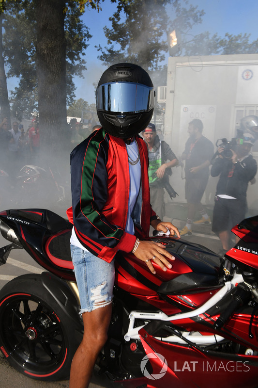 Lewis Hamilton, Mercedes AMG F1 arrives at the track on his motorbike