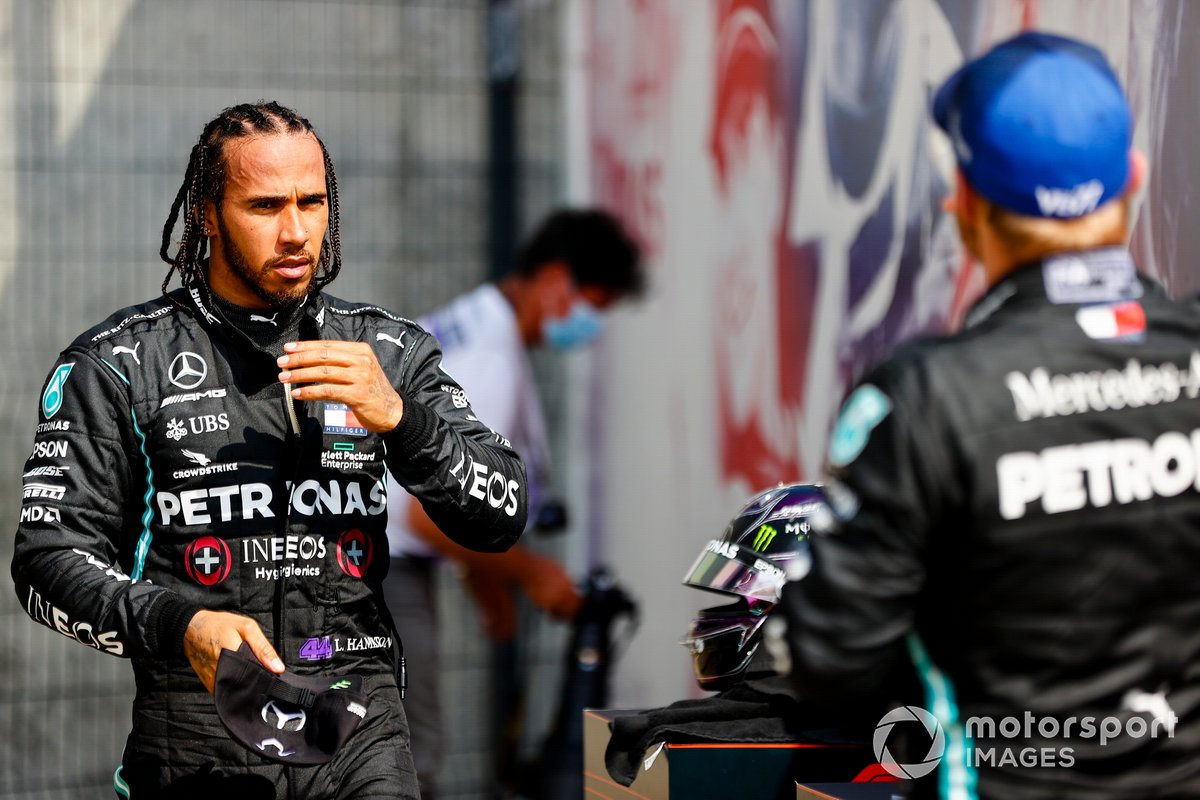 Lewis Hamilton, Mercedes AMG F1, and Valtteri Bottas, Mercedes AMG F1, talk in Parc Ferme