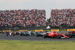 Sebastian Vettel, Ferrari SF70H and Lewis Hamilton, Mercedes-Benz F1 W08 clash at the start of the