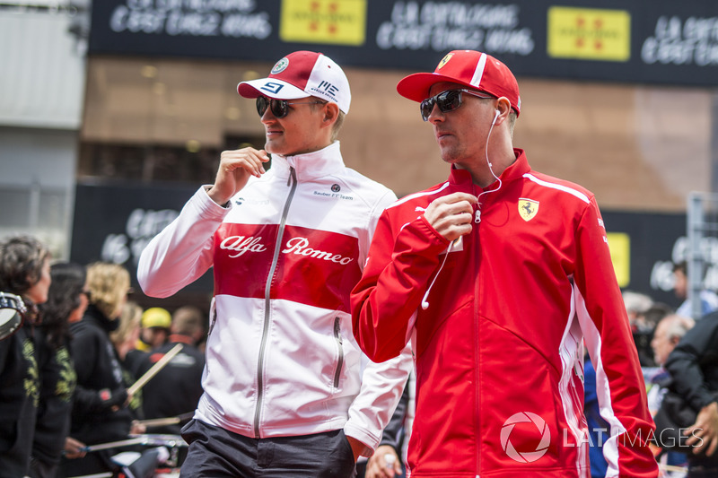 Marcus Ericsson, Sauber and Kimi Raikkonen, Ferrari