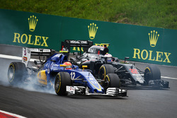 Felipe Nasr, Sauber C35; Jenson Button, McLaren MP4-31