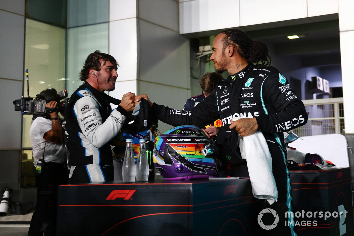 Fernando Alonso, Alpine F1, 3rd position, and Lewis Hamilton, Mercedes, 1st position, congratulate each other in Parc Ferme