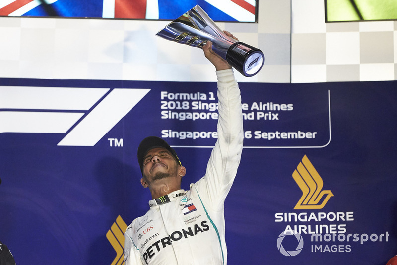 Lewis Hamilton, Mercedes AMG F1, 1st position, lifts his trophy on the podium