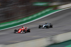 Sebastian Vettel, Ferrari SF70H and Valtteri Bottas, Mercedes-Benz F1 W08 sparks