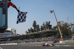 Esteban Ocon, Sahara Force India VJM10 takes the chequered flag at the end of Qualifying