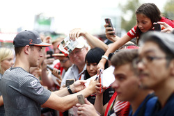 Stoffel Vandoorne, McLaren, signs autographs for fans
