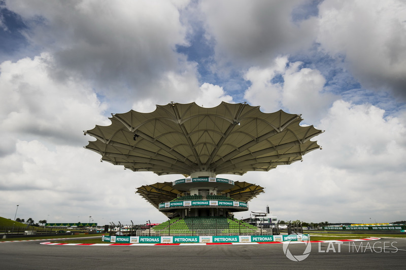 A covered grandstand at the final corner