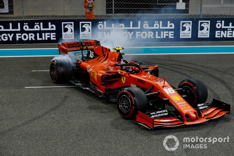Charles Leclerc, Ferrari SF90, 3rd position, performs a donut on the grid in celebration, at the end of the 2019 Abu Dhabi GP.