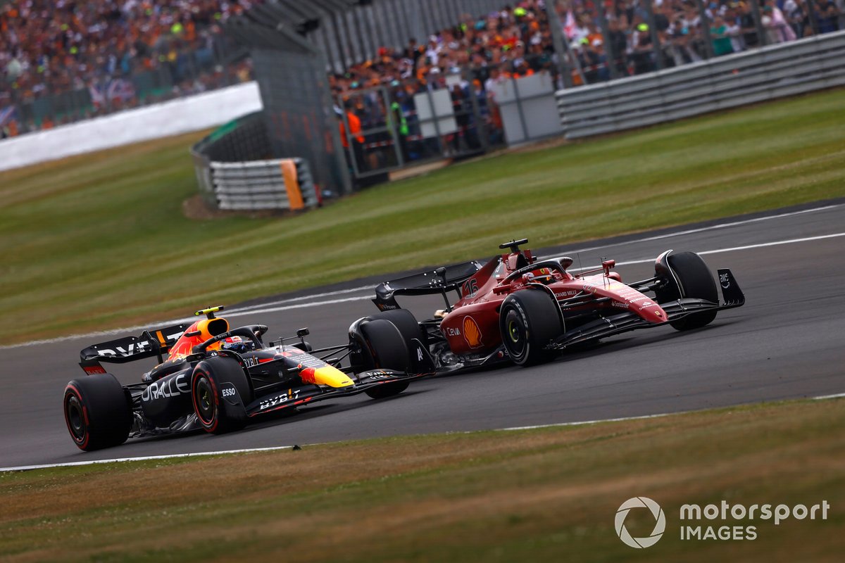 Charles Leclerc, Ferrari F1-75 Sergio Perez, Red Bull Racing RB18