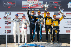 Podium: race winners, Ricky Taylor, Jordan Taylor, Wayne Taylor Racing, PC first place, Mikhail Goik