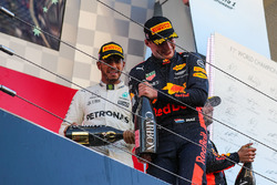 Lewis Hamilton, Mercedes AMG F1 and Max Verstappen, Red Bull Racing celebrate on the podium with the