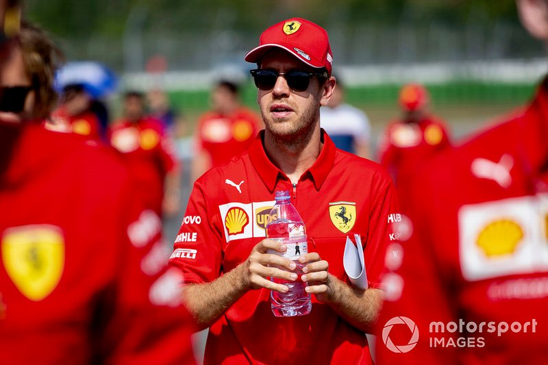 Sebastian Vettel, Ferrari walks the track