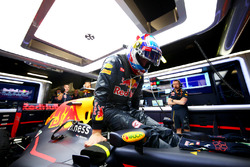Max Verstappen, Red Bull Racing gets into his car in the garage