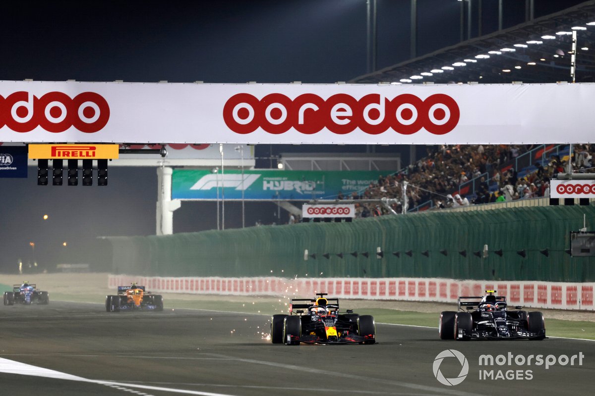 Pierre Gasly, AlphaTauri AT02, battles with Max Verstappen, Red Bull Racing RB16B