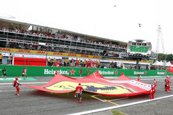 Ferrari fans invade the circuit at the end of the race