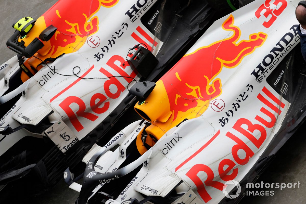 The cars of Max Verstappen, Red Bull Racing RB16B, 2nd position, and Sergio Perez, Red Bull Racing RB16B, 3rd position, in Parc Ferme