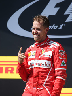 Podium: race winner Sebastian Vettel, Ferrari
