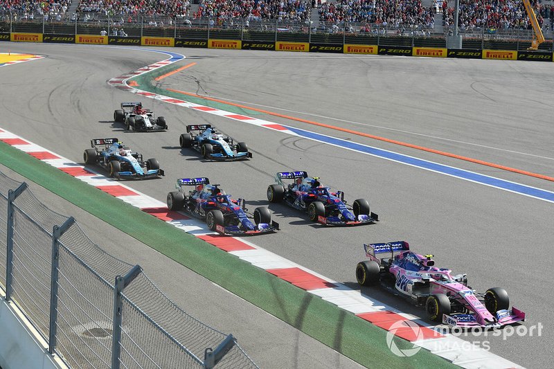 Lance Stroll, Racing Point RP19, leads Pierre Gasly, Toro Rosso STR14, Daniil Kvyat, Toro Rosso STR14, George Russell, Williams Racing FW42, Robert Kubica, Williams FW42, and Kimi Raikkonen, Alfa Romeo Racing C38, at the start