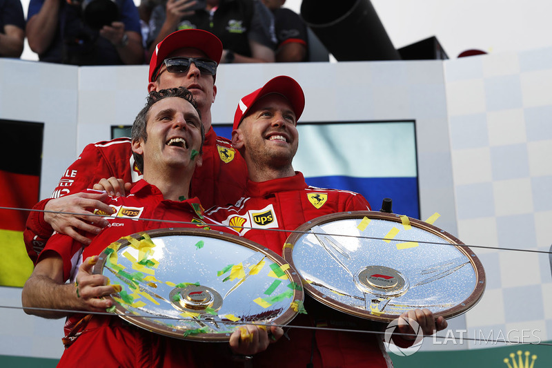 Race winner Sebastian Vettel, Ferrari celebrates on the podium with Kimi Raikkonen, Ferrari and the