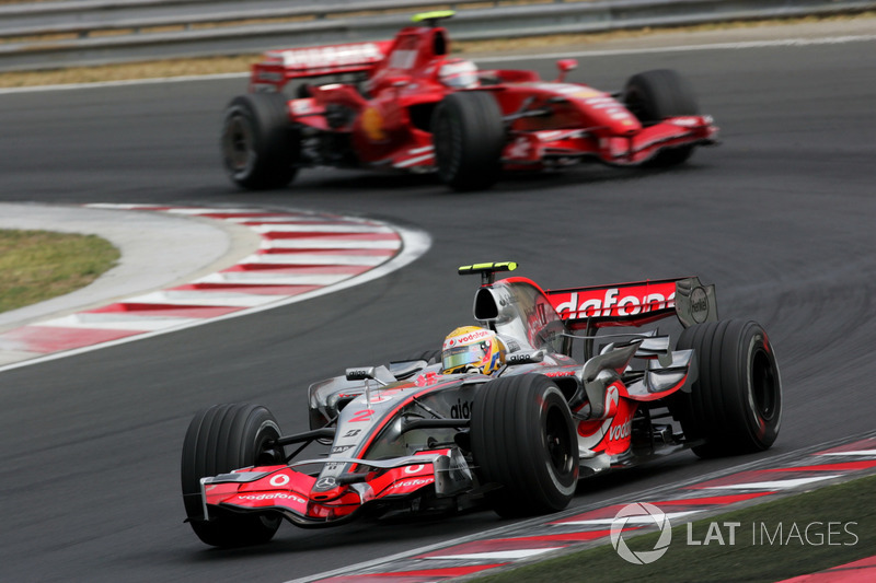 Lewis Hamilton, Mclaren MP4-22 leads Kimi Raikkonen, Ferrari F2007