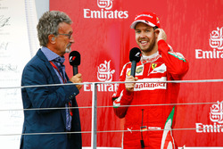 (L to R): Eddie Jordan, on the podium with second placed Sebastian Vettel, Ferrari