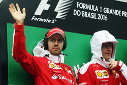 Lotus F1 Team Sebastian Vettel, Ferrari with Kimi Raikkonen, Ferrari on the drivers parade