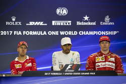 Race winner Lewis Hamilton, Mercedes AMG F1, second place Sebastian Vettel, Ferrari, third place Kim