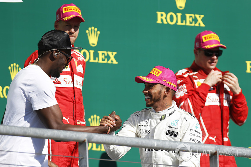 Podio: ganador de la carrera Lewis Hamilton, Mercedes AMG F1, segundo lugar Sebastian Vettel, Ferrari, tercer lugar Kimi Raikkonen, Ferrari y Usain Bolt