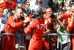 Third place Sebastian Vettel, Ferrari, celebrates, his team