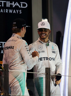 World Champion Nico Rosberg, Mercedes AMG F1 shakes hands with team mate and race winner Lewis Hamil