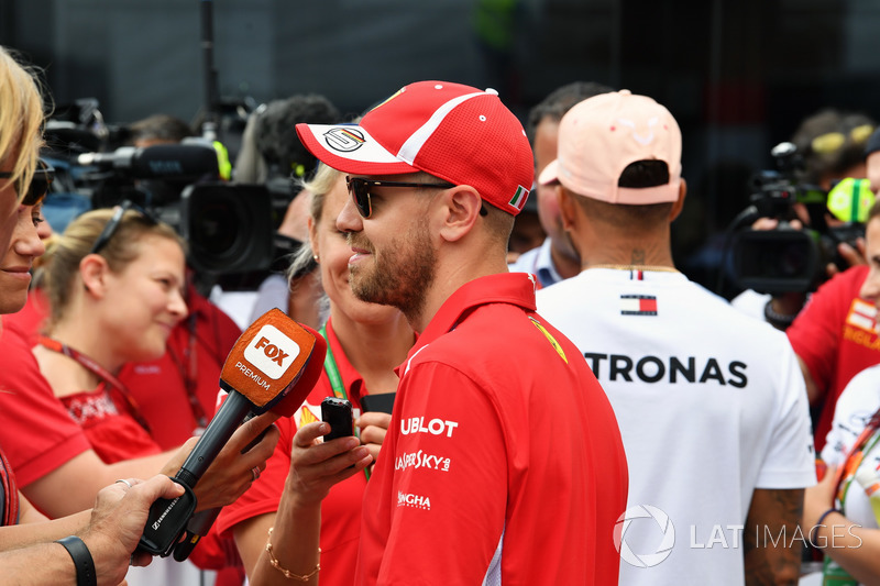 Sebastian Vettel, Ferrari and Lewis Hamilton, Mercedes-AMG F1