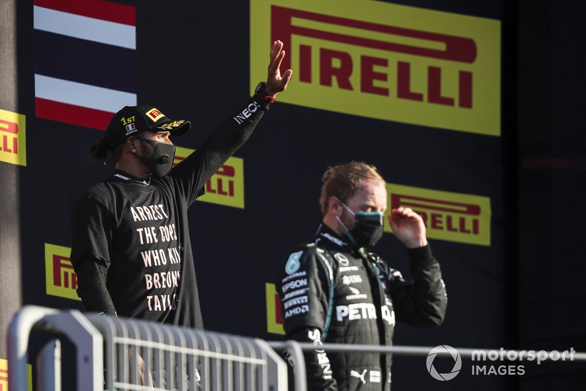 Lewis Hamilton, Mercedes-AMG F1, 1st position, and Valtteri Bottas, Mercedes-AMG F1, 2nd position, on the podium
