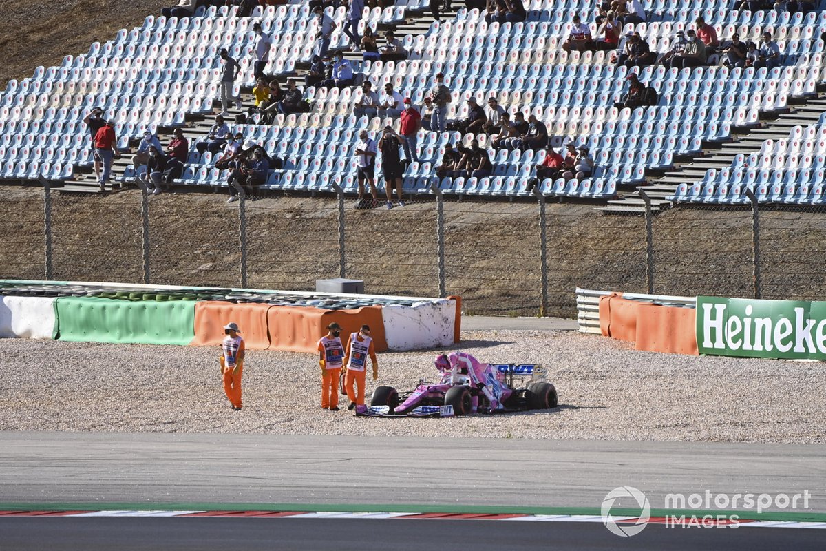 Lance Stroll, Racing Point RP20, climbs out of his car after a collision with Max Verstappen, Red Bull Racing RB16