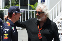 Max Verstappen, Red Bull, greets Flavio Briatore