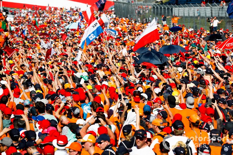 Dutch Max Verstappen fans storm the track to celebrate the victory of Max Verstappen, Red Bull Racing