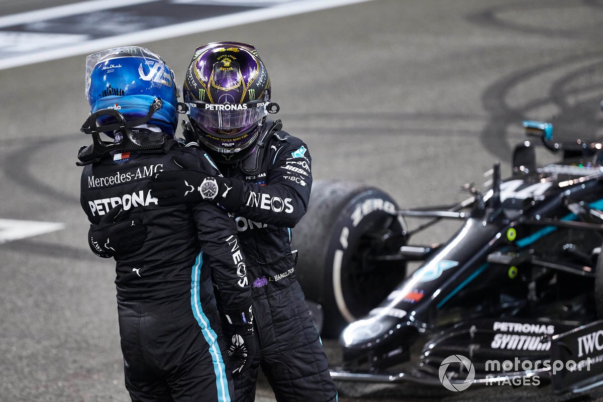 Valtteri Bottas, Mercedes-AMG F1, 2nd position, and Lewis Hamilton, Mercedes-AMG F1, 3rd position, congratulate each other on the grid