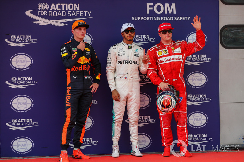 Pole sitter Lewis Hamilton, Mercedes AMG F1 celebrates in parc ferme, Max Verstappen, Red Bull Racing and Kimi Raikkonen, Ferrari