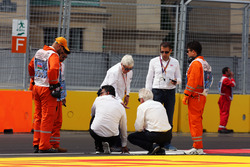 Charlie Whiting, FIA Delegate and Herbie Blash, FIA Delegate inspect the circuit after GP2 qualifyin