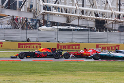 Max Verstappen, Red Bull Racing RB13, Sebastian Vettel, Ferrari SF70H, battle hard at the start of t