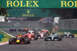 Max Verstappen, Red Bull Racing RB13 leads at the start of the race with Lewis Hamilton, Mercedes-Be