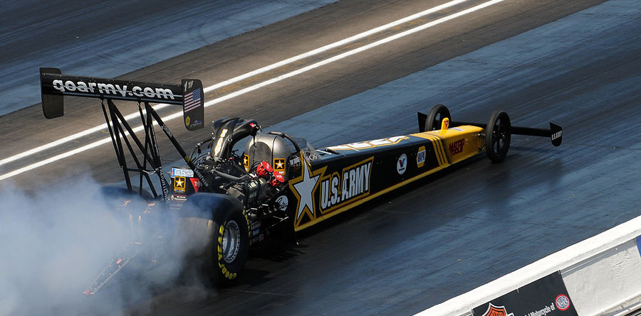 Schumacher re-writes history, wins US Nationals