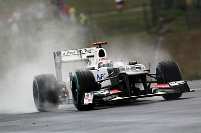Kobayashi splashes his way to Friday's fastest lap at Spa in Belgium