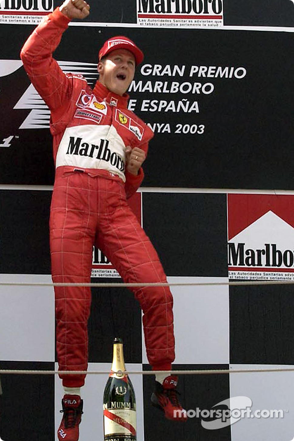 The podium: race winner Michael Schumacher celebrates | FORMULA 1